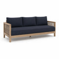 Sofa drewniana z drewna tekowego z granatowymi poduszkami
